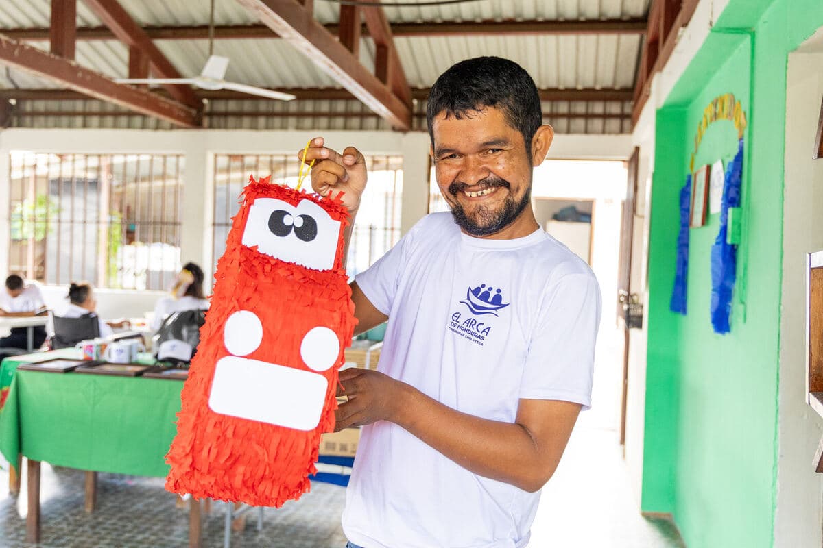 Proud of his piñata at the workshop